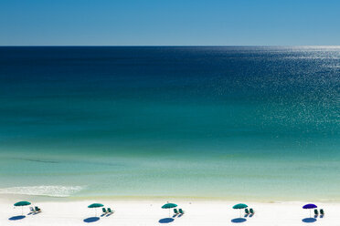 Beach umbrellas and deck chairs on beach, Destin, Florida, USA - ISF18372