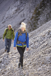 Austria, Innsbruck, Nordkette, climbers walking towards starting point - CVF01025
