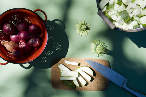 Preparing courgettes for preserving stock photo