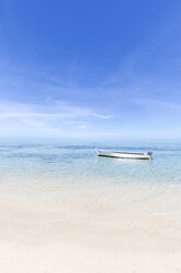 Mauritius, Riviere Noire District, motor boat in turquoise water - MMAF00431