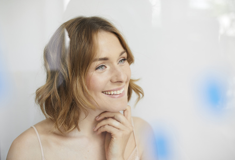 Portrait of smiling woman wearing top stock photo
