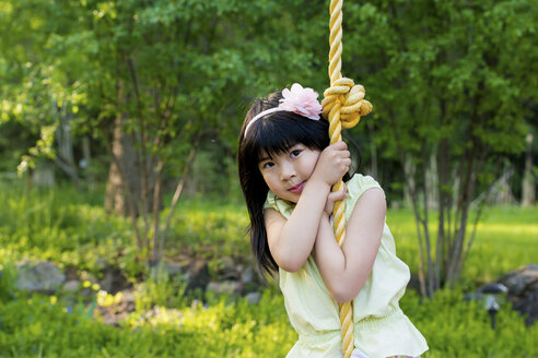 Girl on rope swing - ISF19093