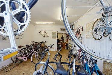 A bicycle shop, stocked with sports bikes, mountain and road bicycles. - MINF03610