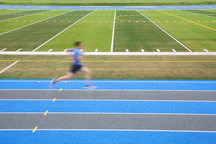 Young Athlete Running Down The Track With Motion Blur Added Stock Photo,  Picture and Royalty Free Image. Image 5840991.