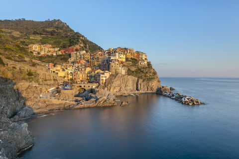 Italy, Liguria, La Spezia, Cinque Terre National Park, Manarola in the evening light stock photo