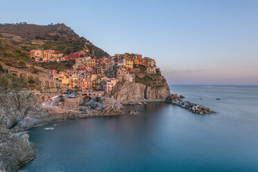 Italy, Liguria, La Spezia, Cinque Terre National Park, Manarola in the evening light - RPSF00215