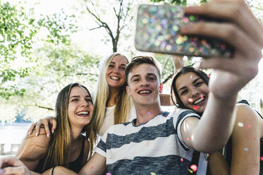 Group of happy friends taking a selfie outdoors - UUF14871