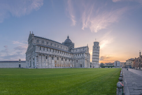 Italy, Tuscany, Pisa, View to Pisa Cathedral and Leaning Tower of Pisa from Piazza dei Miracoli at sunset - RPSF00233