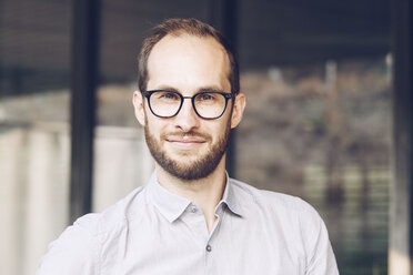 Portrait of bearded businessman wearing glasses - NGF00478