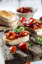 Italian buschetta on chopping board - SBDF03719