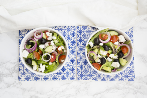 Two bowls of Greek salad stock photo