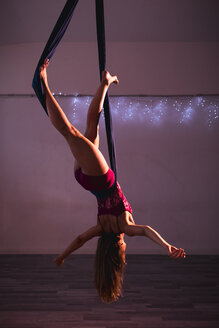 Aerial silks performer during a performance - MAUF01674