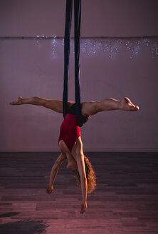 Aerial silks performer during a performance - MAUF01676