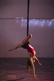 Aerial silks performer during a performance - MAUF01678