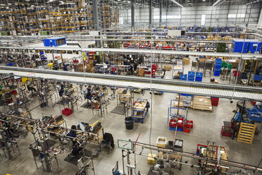 High angle interior view over the work floor, rows of machines in a bicycle factory. - MINF05478