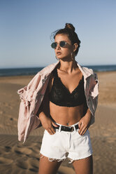 Portrait of fashionable teenage girl on the beach - ACPF00162