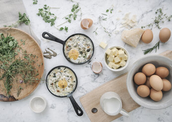 Overhead view of a table with food in dishes. - MINF06448