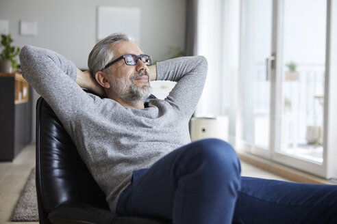 Portrait of mature man relaxing at home - RBF06477