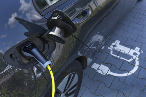 Charging of an electric car stock photo