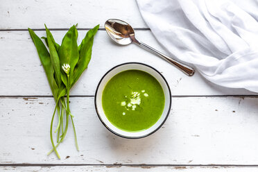 Bowl of ramson soup garnished with cream - SARF03890