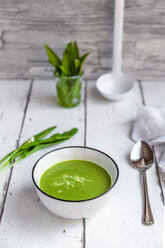 Bowl of ramson soup garnished with cream - SARF03892