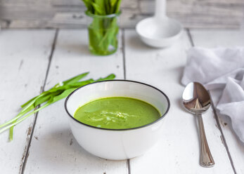 Bowl of ramson soup garnished with cream - SARF03893