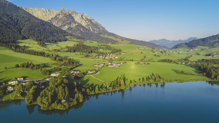 Austria, Tyrol, Kaiserwinkl, Aerial view of lake Walchsee - AIF00540