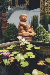 Thailand, Chiang Mai, Buddha statues and pond of water lilies in Wat Inthakhin Sadue Muang temple - GEMF02257