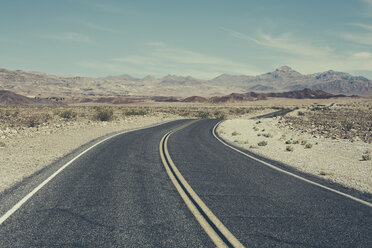 Curving road through desert, near Death Valley National Park, USA. - MINF07105