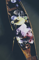 Damnoen Saduak Floating Market, a woman selling goods from boats in floating market - MINF07107