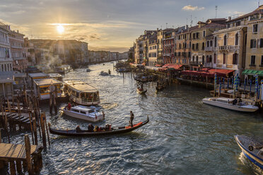 Gondolas moored on a canal lined with historic houses, Venice, Italy. - MINF07484