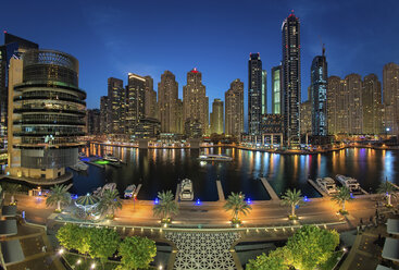 Cityscape of Dubai, United Arab Emirates at dusk, with skyscrapers and the marina in the foreground. - MINF07548