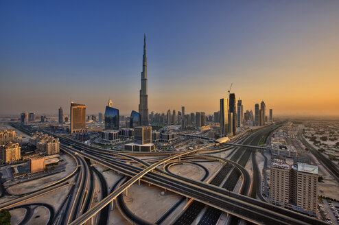 Cityscape of Dubai, United Arab Emirates, with the Burj Khalifa skyscraper and highways in the foreground. - MINF07563