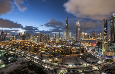 Cityscape of Dubai, United Arab Emirates, with skyscrapers under a cloudy sky. - MINF07571