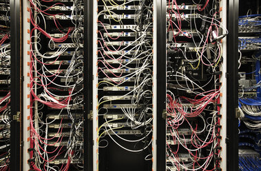 Closeup of CAT 5 cable bundle system in a computer server room - MINF08305