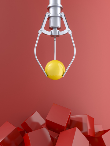 3D rendering, Claw holding yellow ball over pile of red cubes stock photo