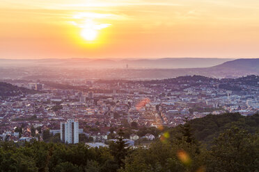 Germany, Baden-Wuerttemberg, cityscape of Stuttgart at sunrise, view from Birkenkopf - WDF04788