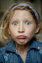 Young girl makes silly faces for the camera - AURF00267