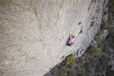 A rock climber ascends a steep rock face in Mexico. - AURF00367