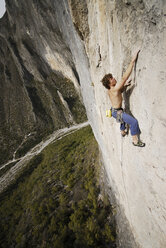 A rock climber ascends a steep rock face in Mexico. - AURF00369