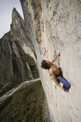 A rock climber ascends a steep rock face in Mexico. - AURF00370