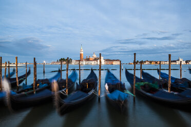 Italy, Venice, Gondolas at San Giorgio Maggiore at night - GIOF04181