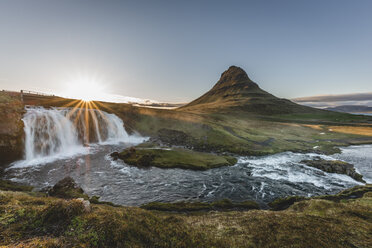 Iceland, Snaefellsnes, Kirkjufell, Kirkjufellsfoss waterfall at sunset - KEBF00886
