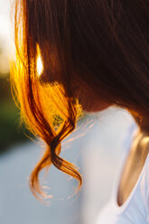 Profile of redheaded woman at backlight - GIOF04227