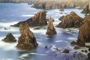 Aerial view of coastline with spiky rock formations. - MINF08800