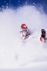 Man skiing deep powder in Utah. - AURF00859