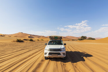Africa, Namibia, Namib desert, Naukluft National Park, off-road vehicle on sand track - FOF10075