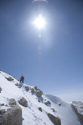 A male skier hiking, Denali, Alaska. - AURF01098