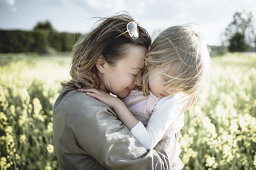 Mother and little daughter together in rape field - PSIF00004