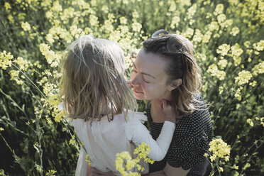 Mother and little daughter together in rape field - PSIF00015